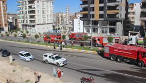 İş yerinde çıkan yangın apartmanı sarmadan kontrol altına alındı